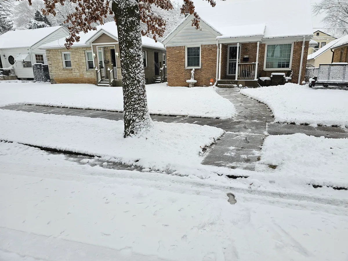 Cleared residential walkway after snow removal